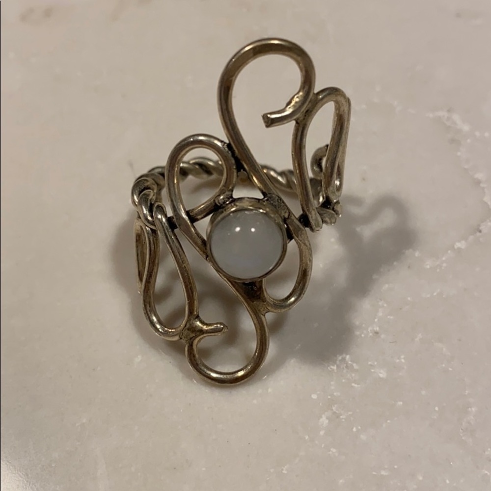 Silver ring with white stone